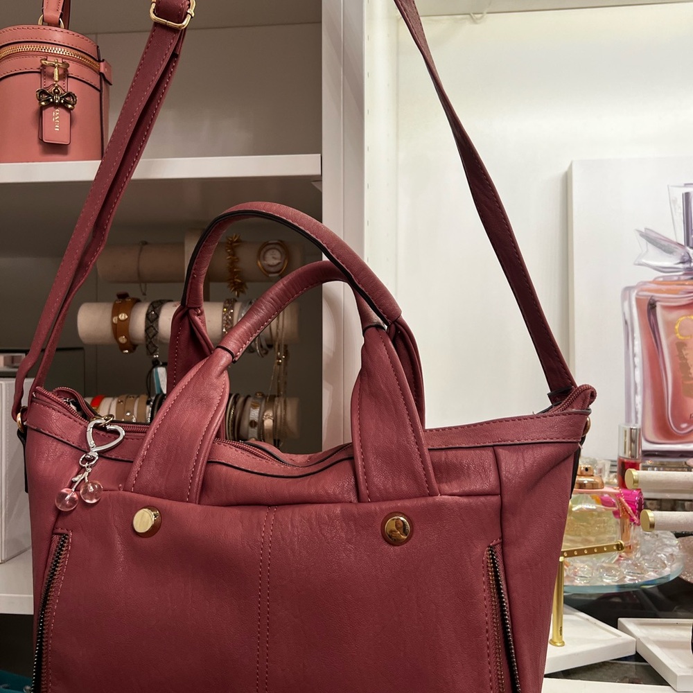 Jessica Simpson mauve color bag.